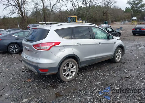 2016 Ford Escape Titanium z USA, uszkodzony, nr VIN 1FMCU0J96GUC19106
